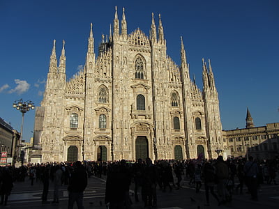 brown cathedral under blue sky during daytime thumbnail