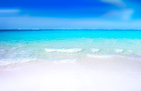 white sand beach during daytime thumbnail