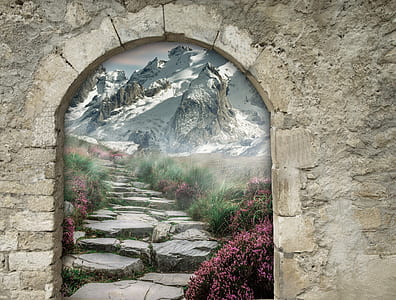 rock pathway leading to mountain covered with snow thumbnail