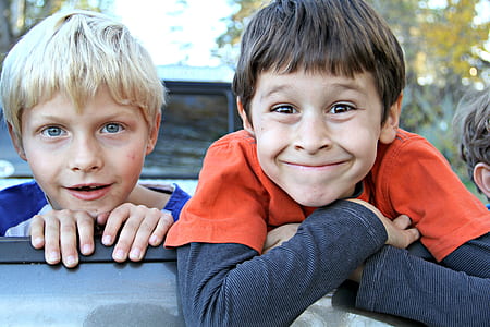 two children wearing clothes thumbnail