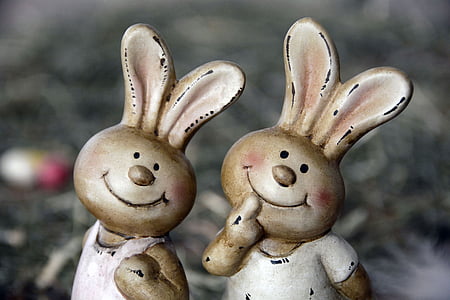 two white rabbit figurines thumbnail
