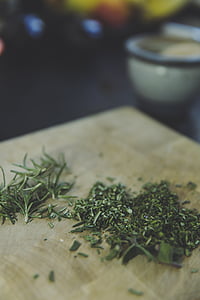 green herbs minced on table thumbnail