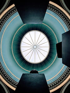 low angle photography of dome building with green ceiling thumbnail