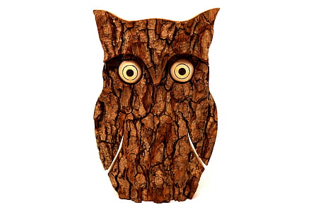 brown and black wooden owl figurine close-up photo thumbnail