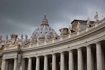 white and blue dome building under gray sky at daytime thumbnail