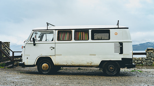 photo of van parked near body of water thumbnail