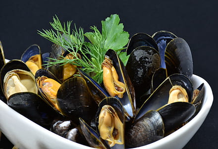 black mussels on ceramic bowls thumbnail