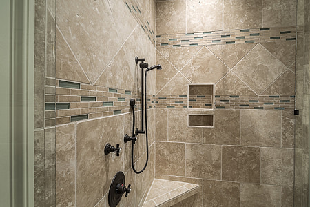 black shower on whit wall thumbnail