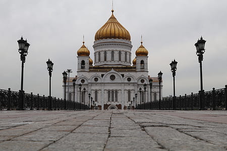 white and gold mosque under cloudysky thumbnail