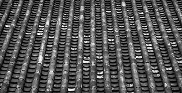grayscale photography of roof shingles thumbnail