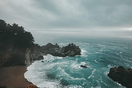 photo of seashore and cliff thumbnail