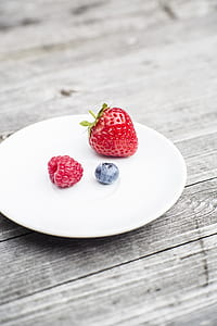 raspberry and blueberry with strawberry on plate thumbnail