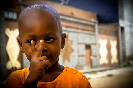 boy in orange top thumbnail