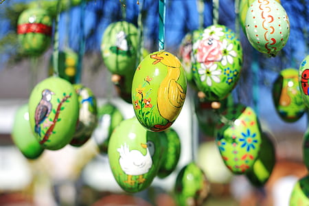 shallow focus photo of assorted green egg hanging decoration lot thumbnail