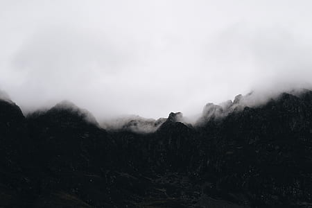 aerial photography of mountain and clouds view during daytime thumbnail