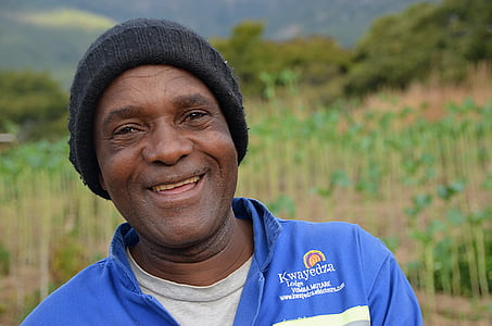 man smiling close-up photo thumbnail