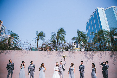 photo of wedding near beige painted wall thumbnail