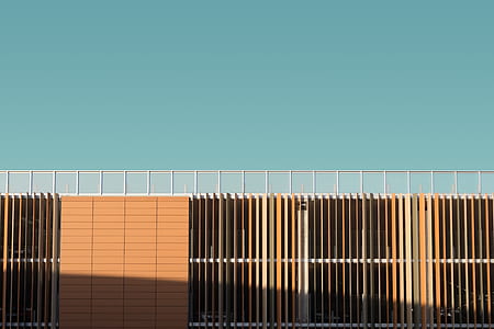 close-up photography of brown building during daytime thumbnail