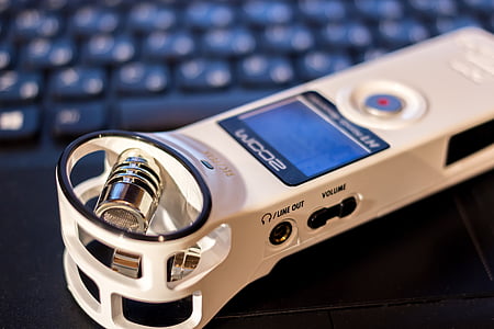 white and black Zoom digital electronic remote controller thumbnail