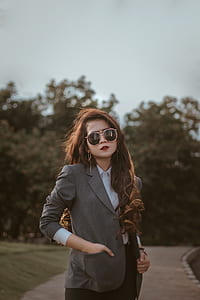 selective focus photography of woman taking selfie thumbnail