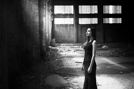 woman wearing black tank dress near wall thumbnail