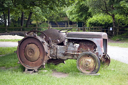 gray tractor on grass thumbnail