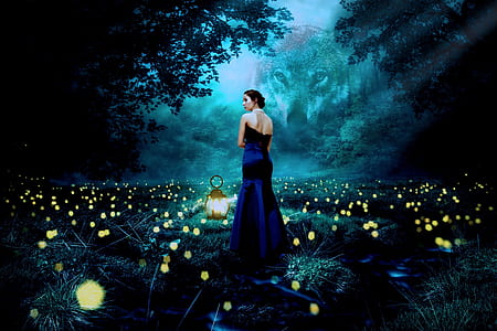 woman standing surrounded by trees and flowers thumbnail