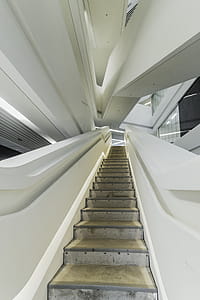 Brown and Gray Stairs With White Rails thumbnail