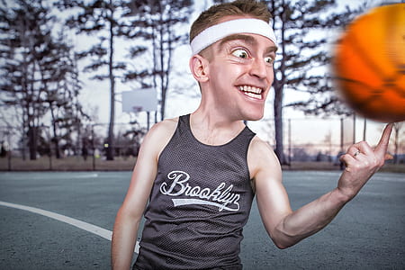 man spinning basketball on finger thumbnail
