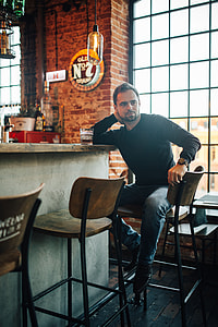 Handsome young man in a pub thumbnail