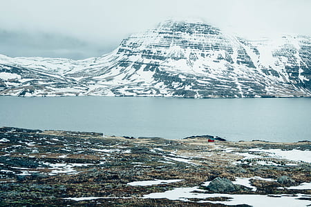 photography of snow capped mountain during daytime thumbnail