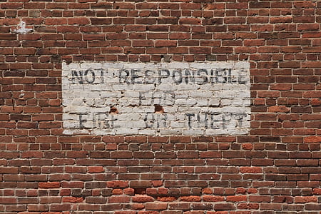 brown brick wall with not responsible text paint thumbnail