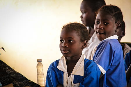 Three Children Wearing School Uniforms thumbnail