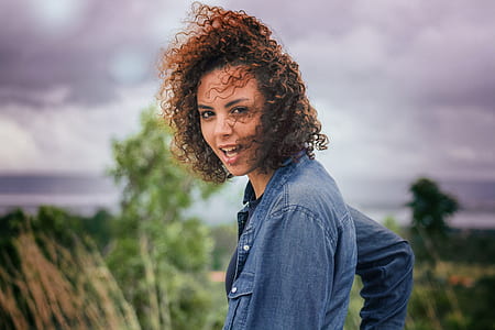 woman wearing blue chambray shirt thumbnail