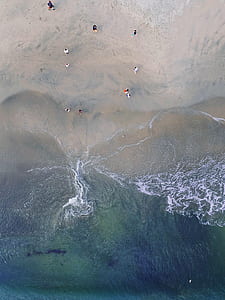 aerial photography of people on shore thumbnail