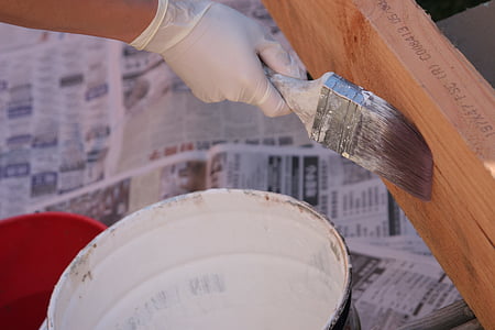 person holding paint brush thumbnail
