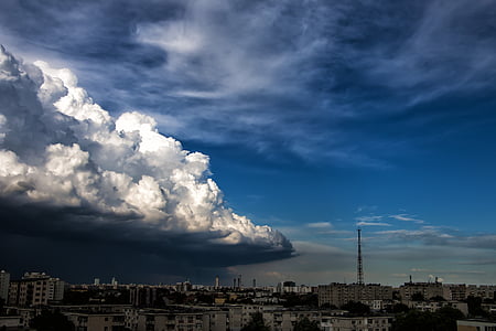 white cloud formation above city thumbnail