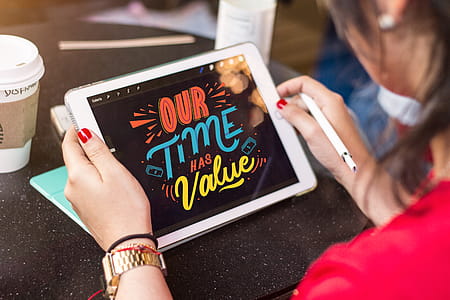 Woman Holding Silver Ipad thumbnail
