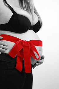 pregnant woman wearing brassiere thumbnail