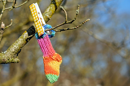 selective focus photography of knit sock thumbnail