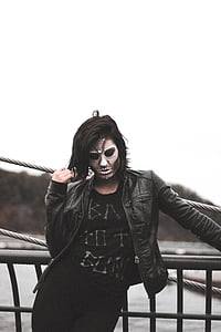woman in black full-zip leather jacket thumbnail