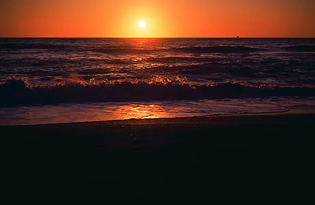 Sunset over beach thumbnail