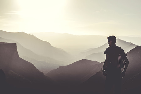 man carrying black Adidas backpack thumbnail