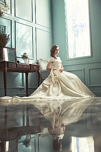 woman in white dress thumbnail