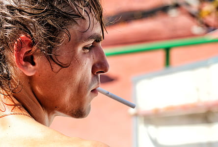 man with white cigarette stick thumbnail