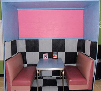 two red leather bench thumbnail