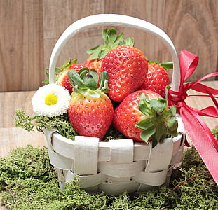 six strawberries on white woven basket thumbnail