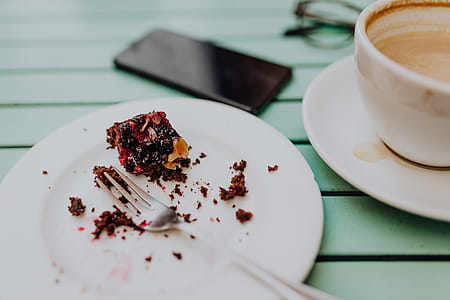 Drinking coffee and eating cake in a cafeteria thumbnail