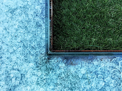 swimming pool beside green grass lawn thumbnail