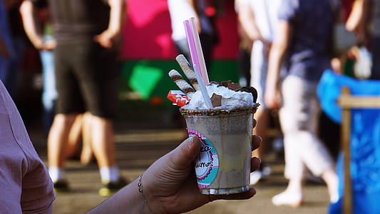 person holding ice cream thumbnail